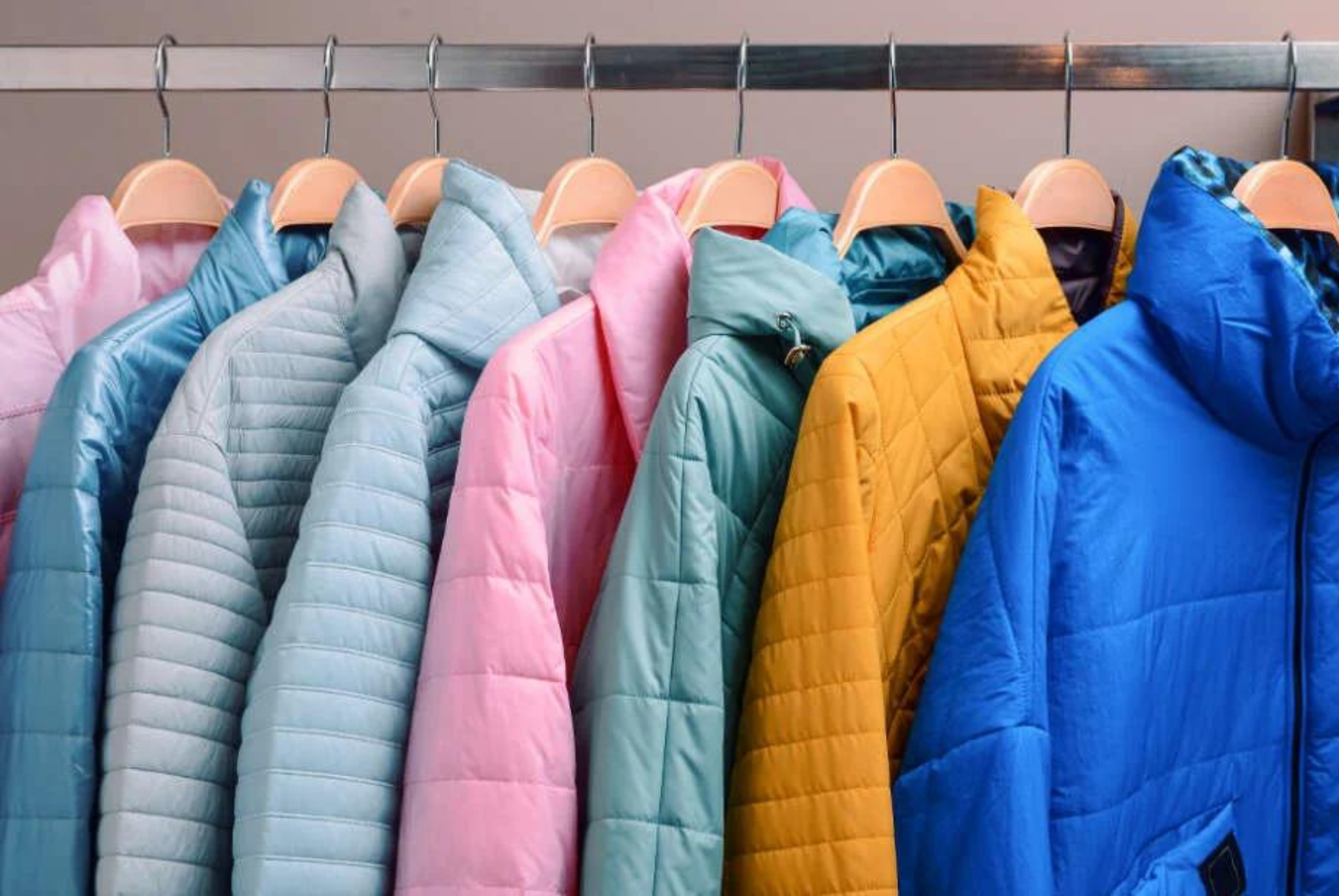 puffer jacket neatly folded and hanging, showcasing smart storage options for winter clothing.
