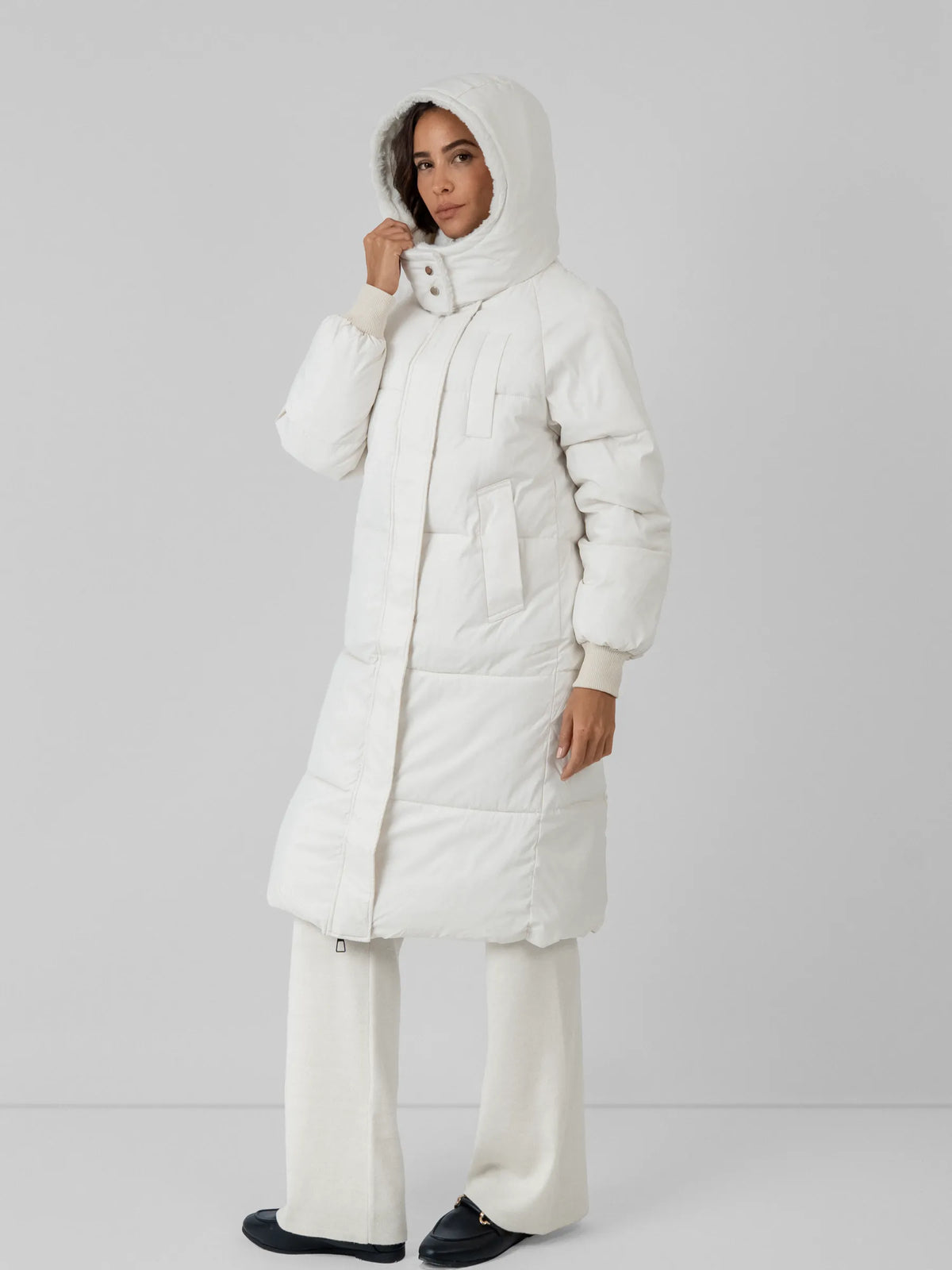 WarmCore™ klassisk lang vattert jakke med hette