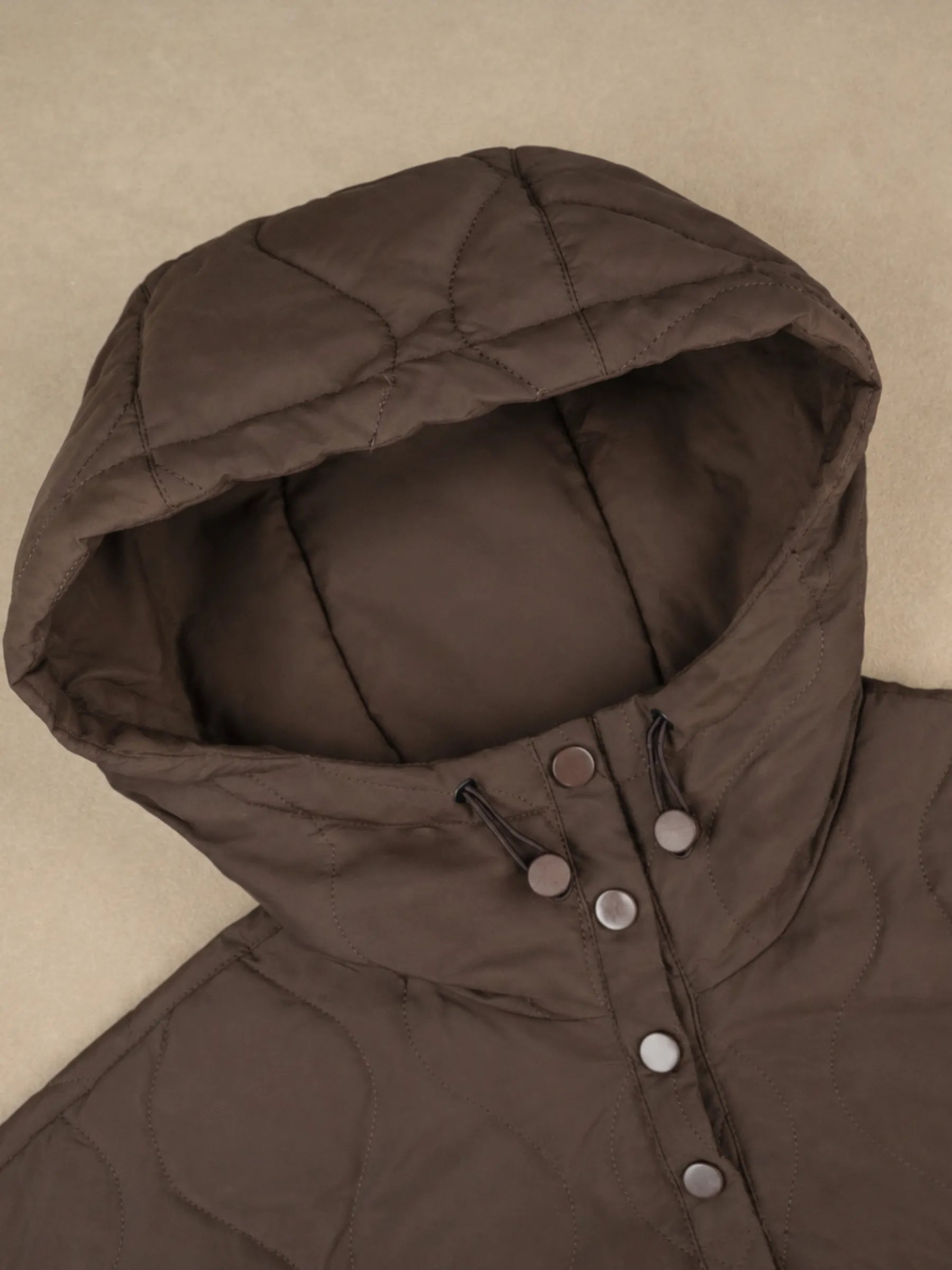Adjustable hood and snap placket detail