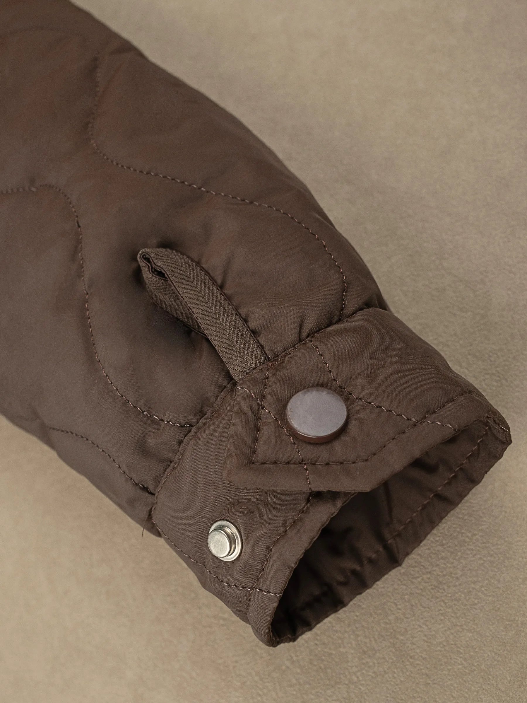 Adjustable snap cuff detail